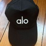 Alo Yoga  Black District Trucker Hat Photo 0