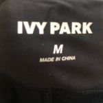 Ivy Park  Womens Black Biker Shorts M Compression Spell Out Waist Knee Length Photo 5