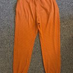 Orange Cuffed Jogger Pants Photo 2