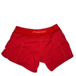 Lululemon Speed Up Short with a 4" inseam in Flamenco Red Swift Photo 8