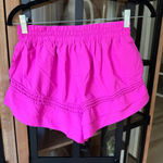 FP Movement Check It Out shorts neon barbie pink workout running pockets Photo 1