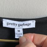 Chic Black Long Sleeve Top with White Bow Details Size M Photo 4