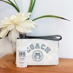 Coach NWT Corner Zip Wristlet In Signature Canvas With Varsity Motif Photo 5