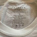 Warner Brothers Official Friends NWT Cropped White Long Sleeve Graphic Tee  PTP: 23 LENGTH: 21 100 % Cotton Photo 2