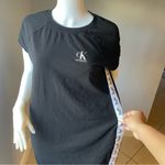 Calvin Klein  dress size Large 
In great condition 
Stretchy 
Logo on both sides Photo 8