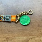 Juicy Couture Pam Gela Plate Friendship Orange Bracelet Silver & Green Crystals Photo 1