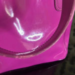 Ted Baker bag in beautiful purple. floral lining with snap closure Photo 6