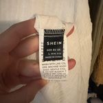 SheIn Large White Button Down Shirt with Black Buttons Photo 1