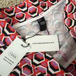 Cider Jazz It Up Printed Trousers with a purple and pink geometric pattern never worn Photo 5