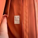 A New Day  Coral purse with Gold embellishments, horseshoe clip close. Photo 3