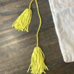 Kendra Scott Cream Dust Bag with Yellow Tassels Photo 3