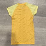 Lululemon Women’s Yellow Swiftly Tech  athletic top Photo 1