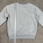 Disney  Winnie The Pooh Sweatshirt Crewneck Graphic Pullover Top Women's L Travel Photo 4