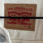 Levi's NWT Women's Ex-Boyfriend Trucker Jacket Butterfly Detail Cream Cotton XS Photo 2