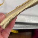 Shimmering Vintage faux leather gold clutch. Photo 11