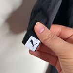 Puma  black modern t-shirt with framed gold spell out logo size S Photo 6