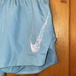 Nike Running Dri-FIT Swoosh mid-rise brief-lined shorts in pale blue size medium Photo 5