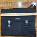 Brookstone black neoprene waterproof lap top bag with detachable shoulder strap. Photo 5
