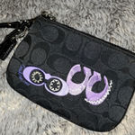 Coach  Signature Corner Zip Wristlet Bag Black Jacquard Fabric Purple Graphics Photo 0