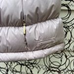 Athleta Downabout Puffer Vest Asymmetric Zip Cardamom Spice Photo 4