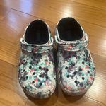 Crocs women’s multi colors lined clog sandals size 10 . Photo 0