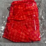 EGO LONG SLEEVE KNOTTED CUT OUT DETAIL MINI BODYCON DRESS IN PINK SPOTTY MESH Photo 10