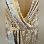 Adam Levine  silver velvet long sleeved romper Photo 2