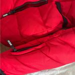 Guess  Red Puffer Jacket with Black Accents Photo 3
