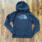 The North Face Black Sweater with Cozy Warmth and Sleek Design medium Photo 1