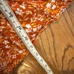 Old Navy  orange floral puff sleeve smocked top size M Photo 7