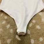 Abercrombie & Fitch white long sleeve snap bodysuit women’s size small Photo 4