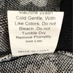 Princess Polly Adora Mini Skirt in Black with White Flowers Photo 6