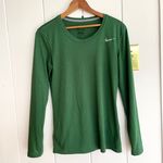 Nike Dri-fit green long sleeve shirt size small  Length: 26 inches  Bust: 14.5 inches  100% polyester Photo 0