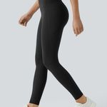 Halara 025HA.-  SoCinched High Waisted Tummy Control Pocket Shaping Training Leggings. Photo 0