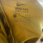 Nike  Pro women's training t-shirt in an olive green color with open back size M Photo 2