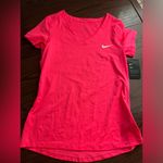 Nike Womens  Dri fit fluorescent pink v neck athletic shirt Photo 0