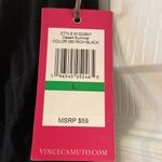 Vince Camuto  size L skirt very soft color black it’s mid length skirt  waist 32” Photo 4