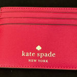 Kate Spade New York Madison Small Slim Card Holder in a vibrant Hot Pink color Photo 0