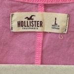 Hollister Barbie pink racerback tank with lace detail in the front. Size large Photo 2