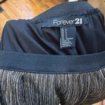 Urban Outfitters Black and Gold Metallic Skater Skirt Photo 1