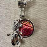 Silver tone fish pink disc charm necklace Photo 1