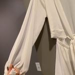 Reverse White Cutout Romper Photo 3