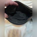 EXPRESS  key & tassle black crossbody purse Photo 2