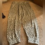 Olivaceous Oliveaceous large animal print pants Photo 1