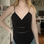 Chic Black Bodysuit Size M Photo 1