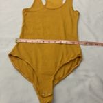 Heart & Hips Mustard Yellow Bodysuit women’s size small Photo 4