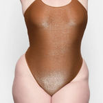 SKIMS 💙 NWT Shimmer Cami Thong Bodysuit in Copper Photo 0