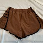 Brown Pleated Athletic Shorts with Black Trim Photo 1