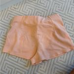 Lululemon  high rise softstreme 2.5” shorts orange, pastel Photo 3