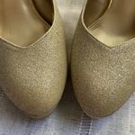 Fioni gold sparkle heels with scalloping. Photo 1